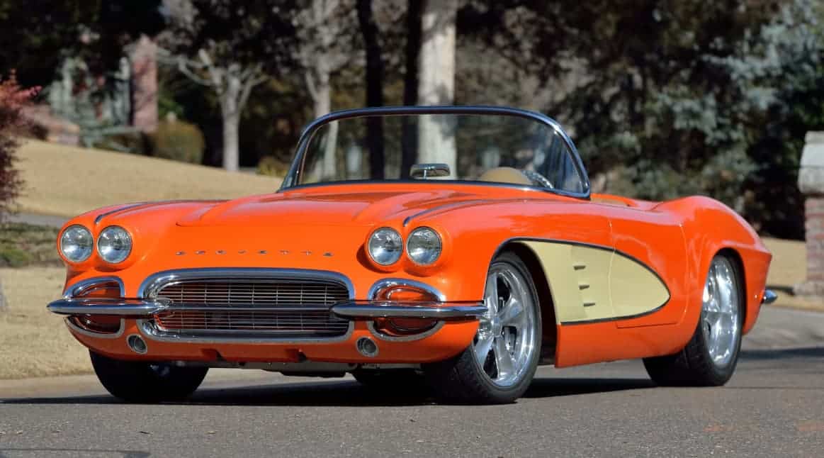 Award-winning 1961 Chevrolet Corvette Custom Rest Mod build with House of Kolor Citric-Hue Tangelo and custom Cream two-tone finish.